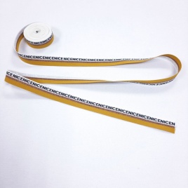 Лента репсовая ш. 19 мм. Бронза на горчице и надписи