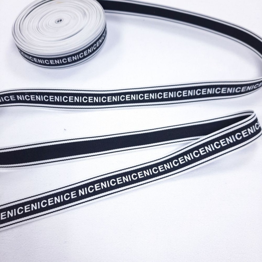 Лента репсовая ш. 24 мм. Nice белый на чёрном фото 1